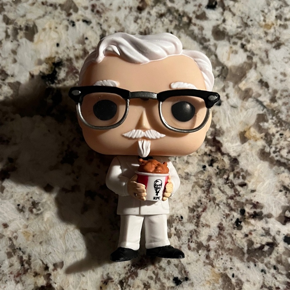 Funko Pop White and Black Figure with Bucket